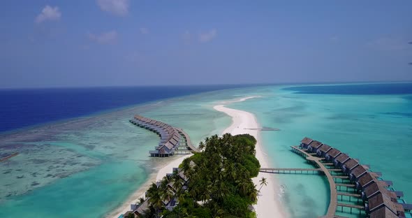 Daytime drone clean view of a summer white paradise sand beach and blue sea background in best quali