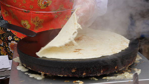 Women Prepare Pancakes