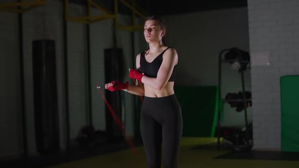 Kickboxing Coordination Training Caucasian Female Fighter Jumps on a Rope Strength Fit Body
