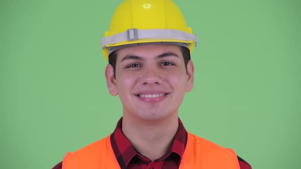 Face of Happy Young Multi Ethnic Man Construction Worker Smiling