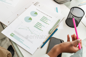 Detailed Business Report - Data Analysis and Trends on a desk