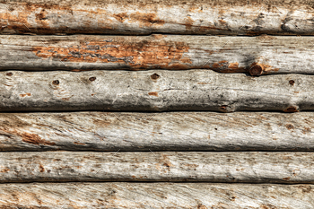 texture of logs, masonry coupling of wooden logs with cuts. Copy Space, Wooden Background.