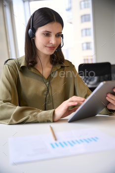 Smiling woman making e-commerce sales calls