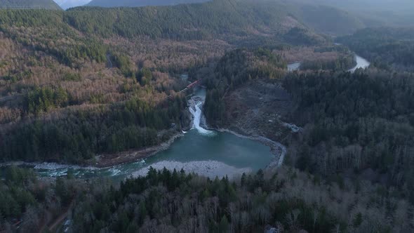 Skykomish River Washington Aerial Shot Of Sunset Falls Train Trestle Waterfall Forest Landslide