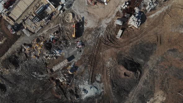 Drone Flying Over a Construction Site with a Top Down View. The Camera Flies Superstructure, Top