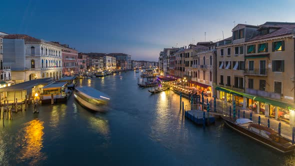 Grand Canal in Venice, Italy Day To Night Timelapse. View on Gondolas and City Lights From Rialto