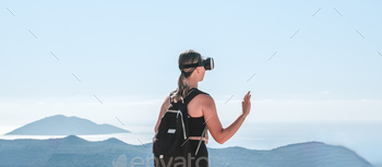 Traveler in virtual reality headset augmented with virtual reality in the concept of a beautiful mou
