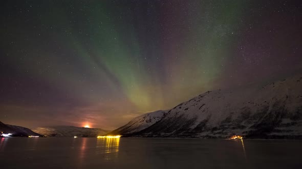 Northernlight in Norway.near the frozen lake.during the frozen night.with the green light in night s