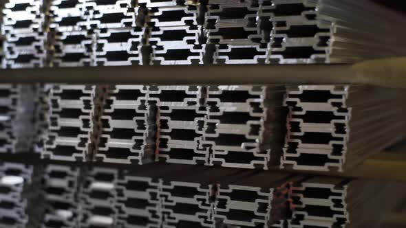 Close Up Shot of Aluminium Profiles. Aluminium Production Line Factory Warehouse Stack of Profiles