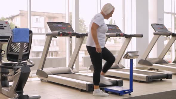 Woman Gets Off the Treadmill and Runs to Check Her Weight Lost Weight or Not Funny Video Sad