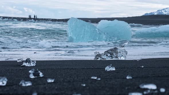 Closeup of Beautiful Iceberg on Black Sand at Diamond Beach in Iceland