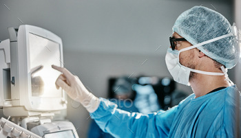Doctor, scrubs and hand with machine in theatre for surgery, cardiovascular analysis or information