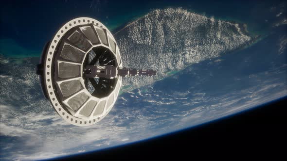 Futuristic Space Satellite Orbiting the Earth alt