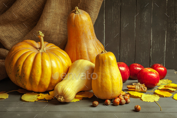 pumpkins on wooden board