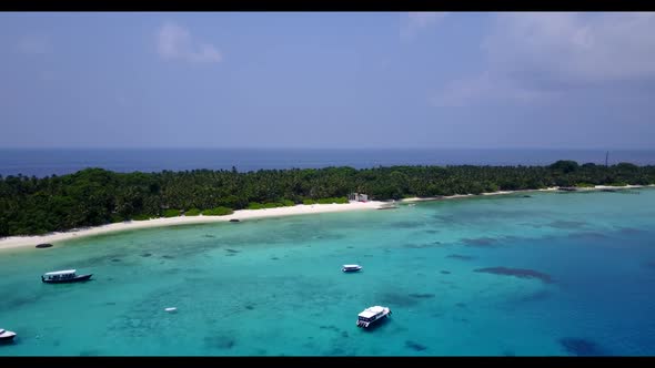 Aerial drone shot nature of tropical seashore beach adventure by clear sea and white sand background