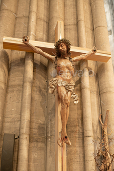 A statue of Jesus hanging from a cross