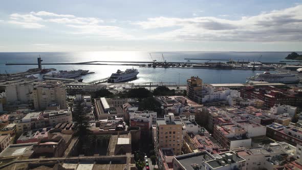 Almería Cityscape by the Mediterranean Sea, Summer destination. Andalusia. Aerial Dolly shot