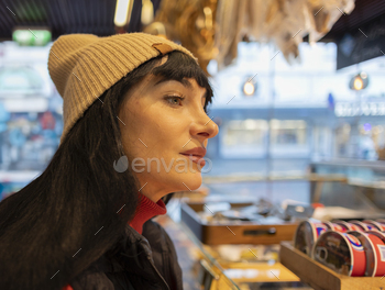 Contemplative Woman at a Local Norwegian Market