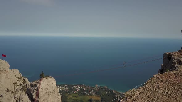 Aerial Shot of the Famous Ai-Petri Mountain and Extreme Bridge in Crimea Against the Backdrop of the