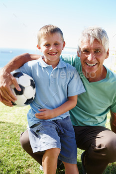 Playing soccer with grandpa