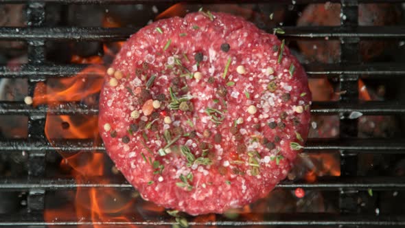 Super Slow Motion Top Shot of Seasoning Falling on Fresh Minced Meat at 1000 Fps