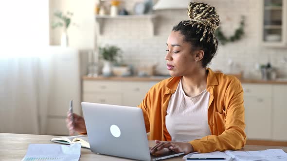 A Busy Satisfied African American Stylishly Dressed Young Woman Modern Business Lady or Real Estate