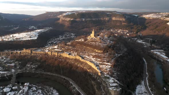 Aerial video above a hill with an old fortress