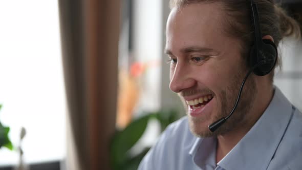 Friendly Bearded Satisfied Man Operator of Call Center or Business Leader Consultant with Headset