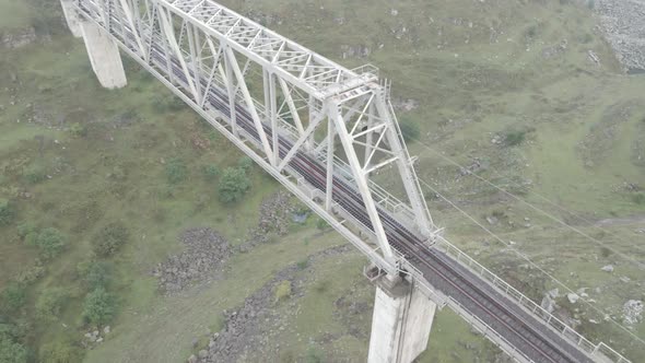 Tsalka, Georgia - August 28 2021: Aerial view of railway bridge in Tsalka