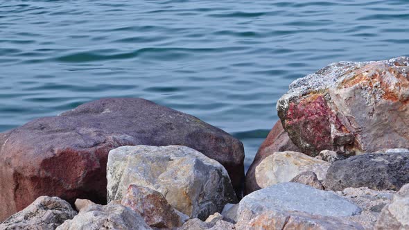 Stones And Wave Movements On The Seashore