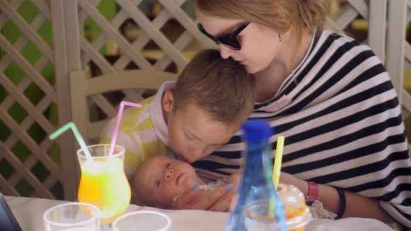 Family of mother with two children enjoying time together