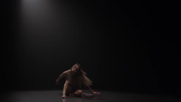 Sexual Woman with Long Hair Dancing Contemporary at Studio. Slow Motion