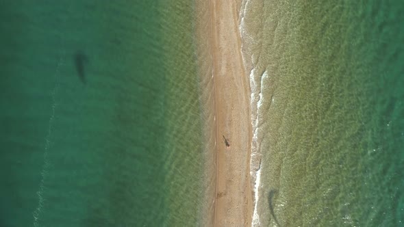 Aerial view of group kitesurfing in the Gulf of Patras, Greece.