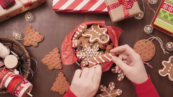 Packaging traditional home made gingerbread cookies as food gifts.