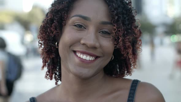 Closeup Shot of Smiling Woman Posing Outdoors