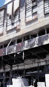 Vertical Video of a Burnt Shopping Center During the War in Bucha Ukraine