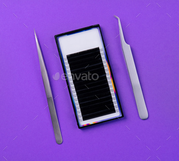 Eyelash extension supplies on purple background