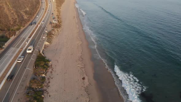 rising aerial view of Malibu, California coastline