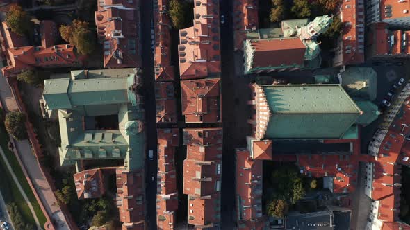 Aerial Birds Eye Overhead Top Down Panning View of Red Tiled Rooftops and Squares in Historic Centre