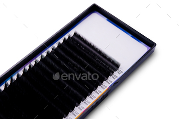 Eyelash extension trays on white background