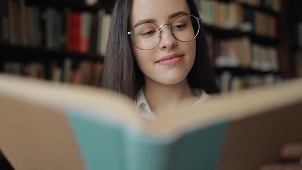 Close Up of Girl Reading Book