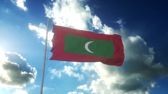 Flag of Maldives Waving at Wind Against Beautiful Blue Sky
