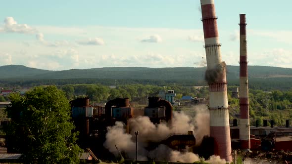 The Collapse of an Industrial Chimney. Explosion of an Old Chimney of an Obsolete Metallurgical