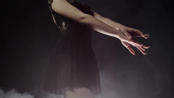 Beautiful Woman Ballerina in Black Dress Standing on the Stage and About To Start Her Dance