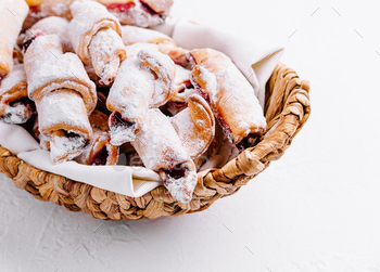 Fresh berry pastries in a basket