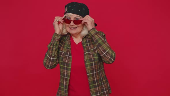 Seductive Cheerful Stylish Senior Old Woman Wearing Sunglasses Charming Smile Blinks Winks Eyes