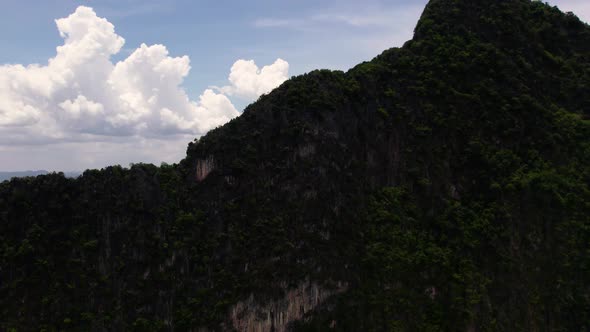 Part of landscape revealed behind mountain, Thailand