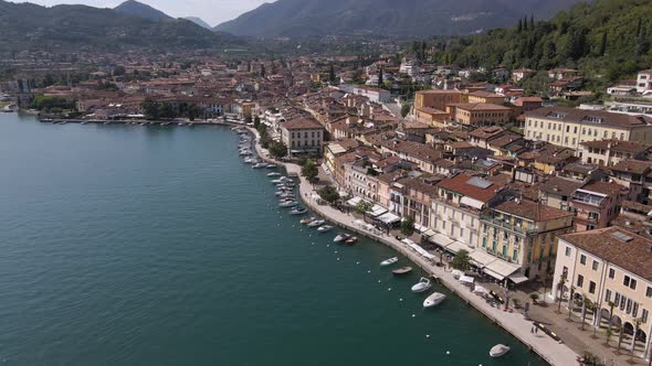 Aerial view, Salo city promenade on Garda lake, Lombardy Italy. Picturesque town and old buildings o