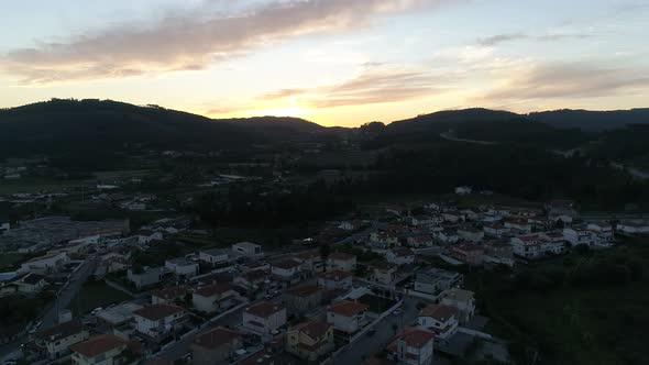 Aerial View of Residential Houses in Suburban Rural Area at Sunset