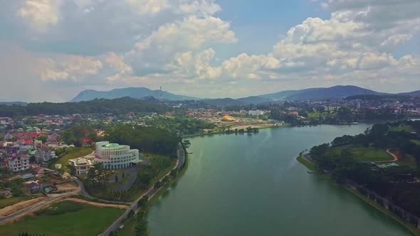 Fantastic Aerial View Quiet Lake with City on Bank